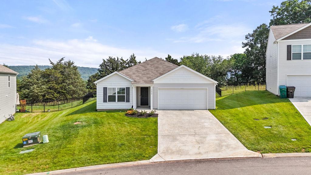 Mockingbird Meadows community exterior showing landscaping and architectural details in Halls