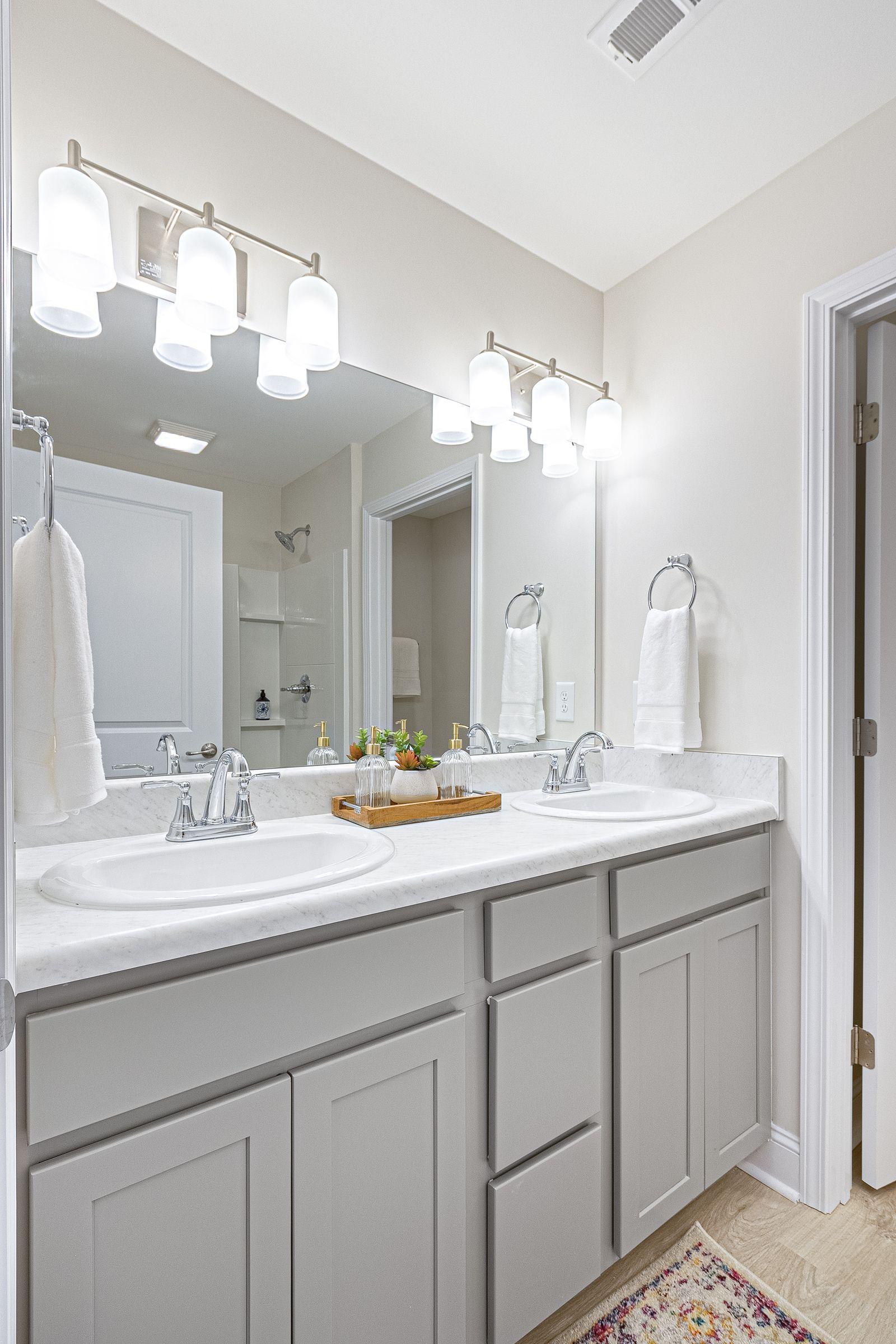 Snowmass modern bathroom with glass shower and premium fixtures