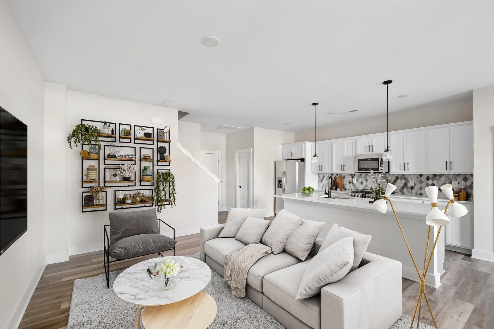 Allston open concept living space with balcony access